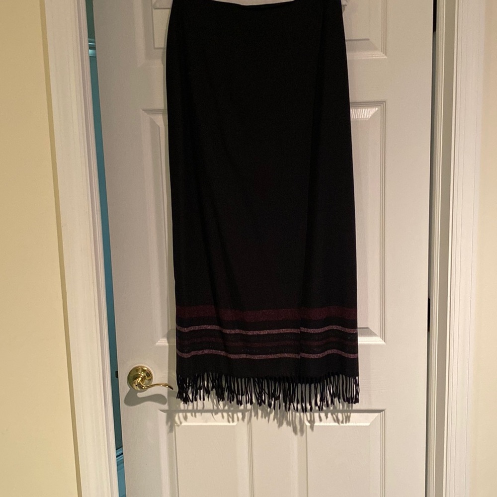 Dana Buckman long black wrap skirt with fringe at the bottom. Size 10